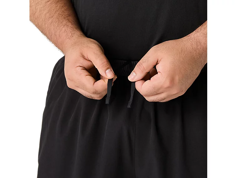 ASICS CORE WOVEN PANT - Homme